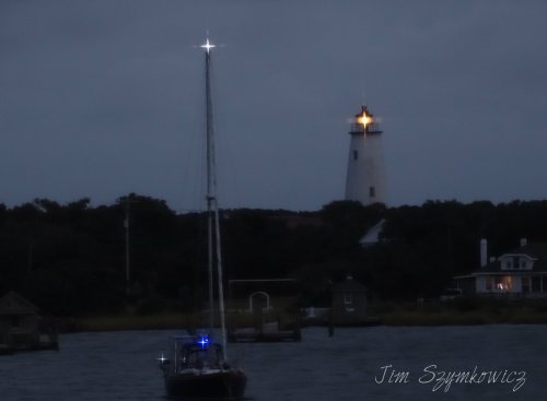 Magpie's Nest Jim Szymkowicz Ocracoke Lighthouse across Silver Lake Harbor